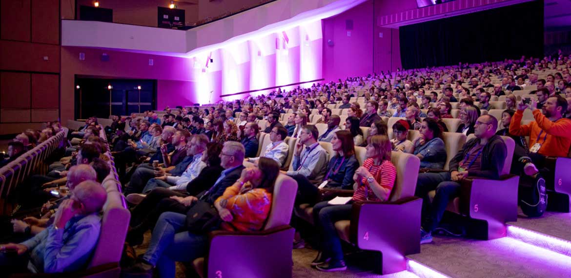a packed auditorium at a EuroSTAR 2019 keynote