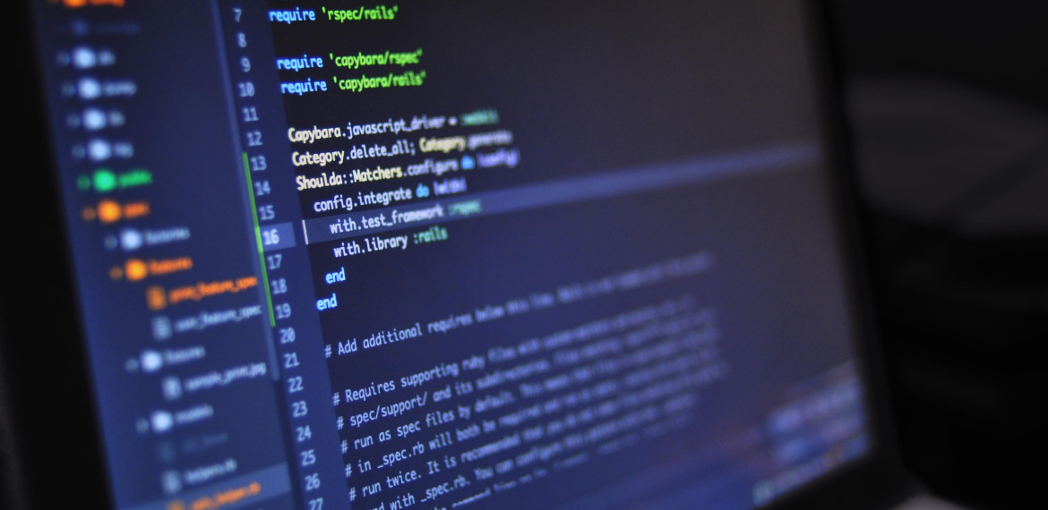 Close-up of software test code on a developer’s screen, highlighting unit testing scripts in a code editor.